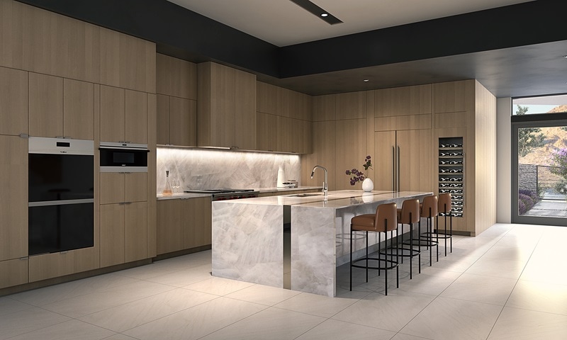 minimalist, elegant kitchen with warm wood furniture and a marble island with bar seating. 