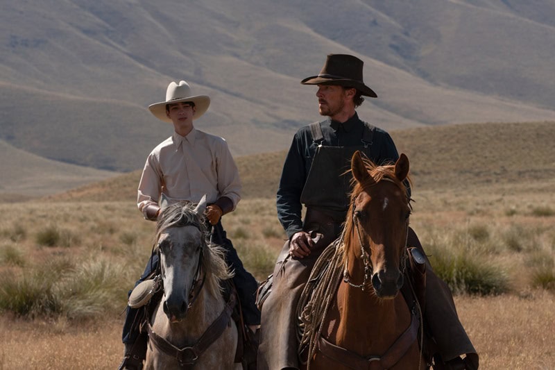 THE POWER OF THE DOG (L to R): KODI SMIT-McPHEE as PETER, BENEDICT CUMBERBATCH as PHIL BURBANK in THE POWER OF THE DOG.