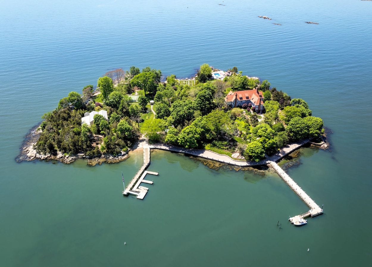 Aerial view of Rogers Island, off the coast of Branford, Connecticut, with the house and two docks in view