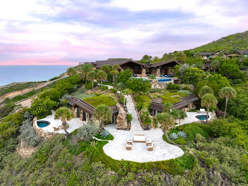 Cliffside Villa with 6 ‘satellite’ bedroom pods and 7 pools lists for $32.5M in the British Virgin Islands