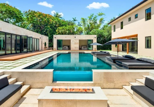 EXCLUSIVE: $18M Design-driven North Pinecrest estate built by GOAT Hospitality founder hits the market