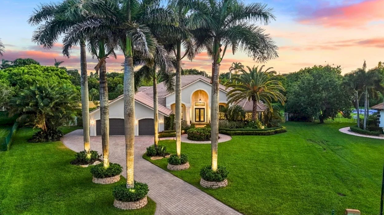 This $2.25M Davie, FL estate sits on the largest lot in Emerald Springs Estates