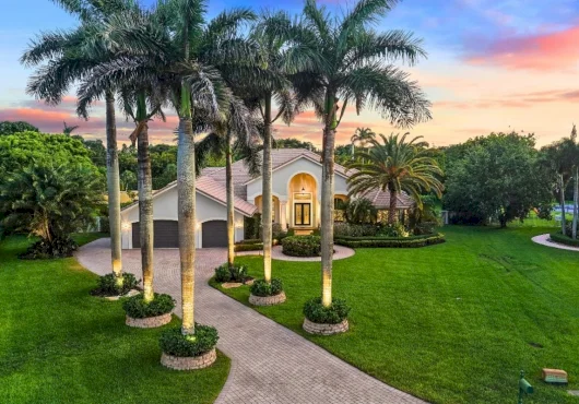 This $2.25M Davie, FL estate sits on the largest lot in Emerald Springs Estates