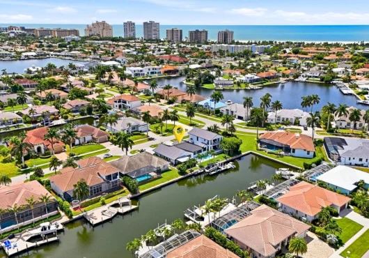 Near Naples, a $6M Marco Island home puts the boat out back and the beach five minutes away