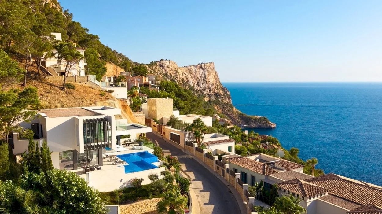 Escape to Mallorca with this $13.5M modern villa overlooking the Mediterranean